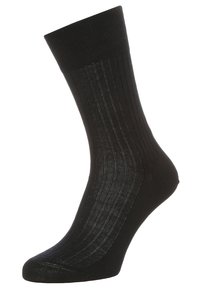 Calza nera a coste realizzata in un materiale morbido ed elasticizzato. Presenta una punta rinforzata e un bordo elastico per una vestibilità sicura.