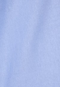 Light blue linen fabric with a subtle texture, showcasing a fine weave and soft appearance, designed for breathable wear.