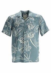 Chemise à manches courtes boutonnée en bleu atténué avec un grand imprimé floral tropical blanc et un col doux.