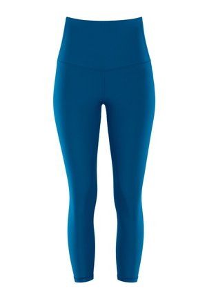 Leggings aderenti a vita alta in tessuto teal uniforme. Realizzati in materiale liscio e elasticizzato, con un design pulito e senza decorazioni visibili.