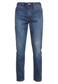 Blå denimjeans med rak benmodell, som har fem fickor, en mässingsknapp och subtila blekningsdetaljer för textur. Klassiska söm detaljer.