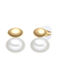 Guldtonade metalörhängen med en slät oval topp och en stor, glänsande vit konstgjord pärla i botten. Har en klassisk stiftdesign.