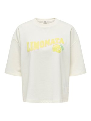 T-shirt oversize color panna con la scritta "LIMONATA" in lettere gialle e una grafica di limone affettato sulla parte frontale.