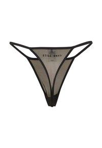 String en maille noire avec fines bretelles, présentant une forme triangulaire. Texte au dos : "ENCORA TIMIDE ?" avec un design minimaliste.