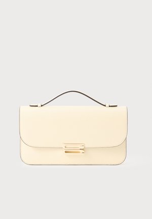 Cream-colored leather handbag with top handle and gold-toned rectangular clasp on a plain light background.