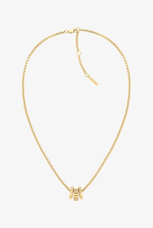 Collar de cadena de oro con un diseño elegante, que cuenta con un cierre decorativo y pequeñas piedras transparentes incrustadas en la pieza central.