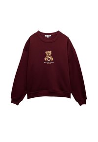 Sudadera burdeos con escote redondeado y corte holgado. Presenta un oso bordado con "PERO PRIMERO CAFÉ" debajo en colores claros.