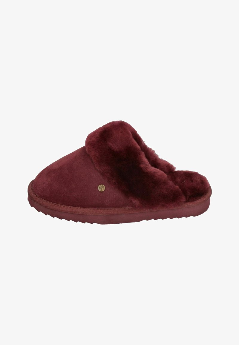 Burgundy suede slipper with fur lining, soft texture, rounded toe, and rubber sole featuring a ridged pattern for grip.