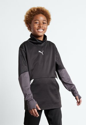 Schwarzes Langarmoberteil mit hohem Kragen, grauen Akzenten und einer weichen Textur. Verfügt über das Puma-Logo auf der Brust. Entworfen für Sportbekleidung.
