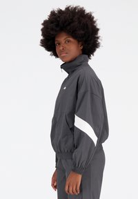 New Balance ATHLETICS JACKET - Summer jacket - blacktop