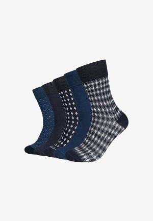 Five pairs of mid-calf socks in blue and black shades with patterns: solid, small dots, diamond shapes, and argyle design.
