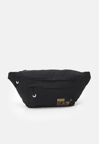 TRAIN CORE MAXI SLING BAG UNISEX - Rumpetaske - black/gold