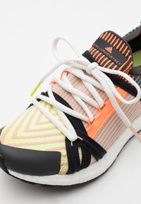 Adidas By Stella Mccartney Ultraboost S Neutral Running Shoes Light Flash Yellow Soft Powder Utility Black Multi Coloured Zalando Co Uk