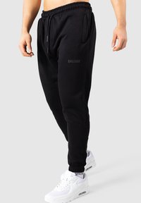 Smilodox TAYLOR - Trainingsbroek - schwarz