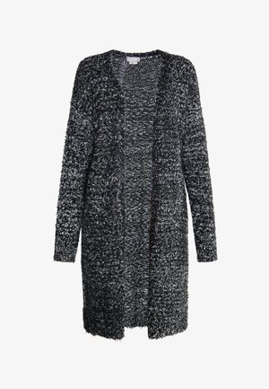 Langer schwarz-weißer, strukturierter Cardigan mit offenem Vorderteil, langen Ärmeln und einem weichen, flauschigen Material. Auffälliges gesprenkeltes Muster überall.