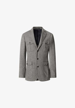 Doppelt gebundener Blazer im schwarz-weißen Hahnentritt-Muster, ausgestattet mit zwei Brusttaschen und zwei Seitentaschen, mit schwarzem Futter.