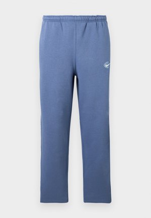 Blue sweatpants with elastic waistband and small white circular logo on upper left thigh, displayed against a plain background.