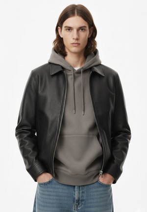 - Kurtka ze skóry ekologicznej