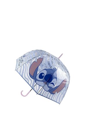 Ombrello a cupola trasparente con strisce zebra blu e bianche e un grande volto di personaggio blu dei cartoni animati che fa l'occhiolino in cima, manico curvo rosa.