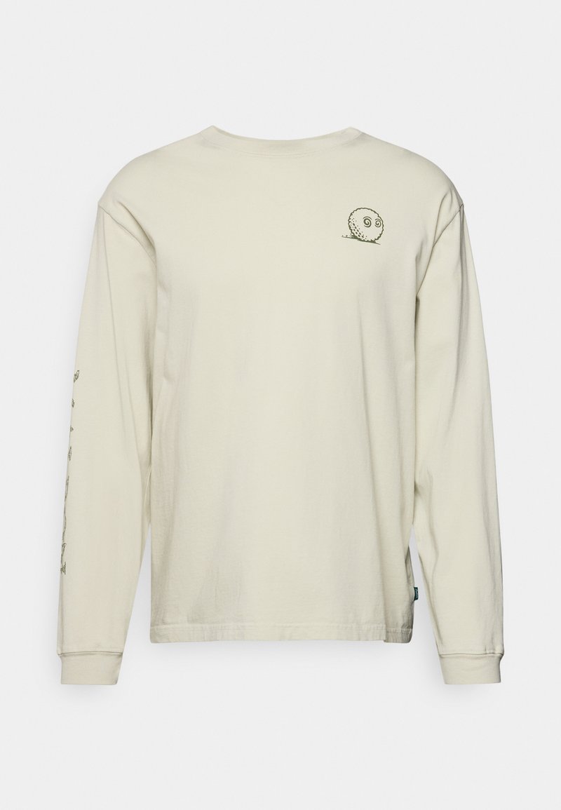 Helebeež pikkade varrukatega pluus, mis on valmistatud puuvillast ja millel on seljal väike roheline graafika ning varrukatel lihtsad õmbluselemendid.