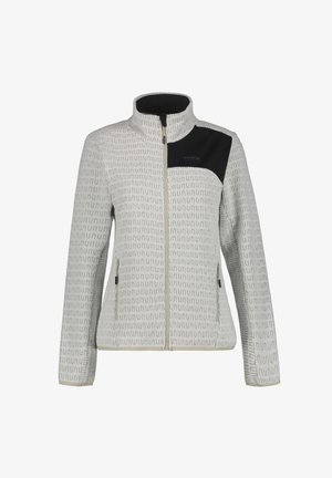 Chaqueta de cremallera gris claro con un patrón texturizado, panel de hombro negro, dos bolsillos laterales, cuello alto y costuras reforzadas.