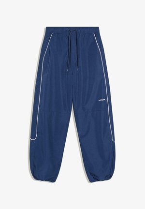 Tmavomodré športové nohavice so šnúrkou v páse, bielym pruhom na bokoch a elastickými manžetami. Vyrobené z ľahkej látky s logom.