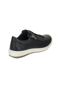 Black leather sneaker with white rubber sole, featuring a side zipper, round toe, and textured fabric lining for added comfort.