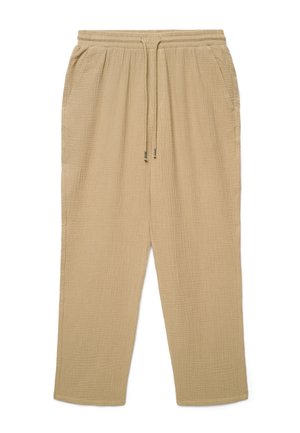 Beżowe spodnie z tkaniny o fakturze, z elastycznym pasem, regulowanym sznurkiem, bocznymi kieszeniami oraz luźnym, prostym fasonem nogawek.