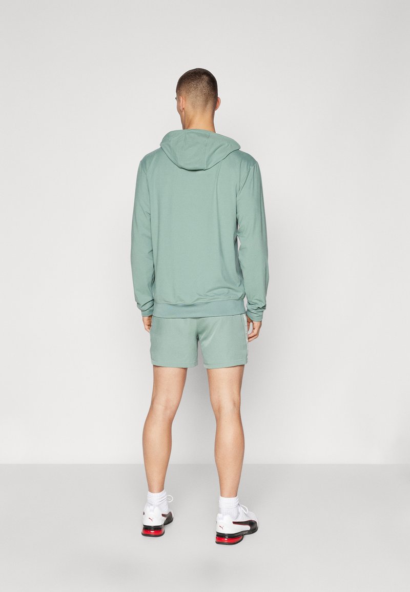 DESIGN - Pantaloni dritti kaki con vita elasticizzata