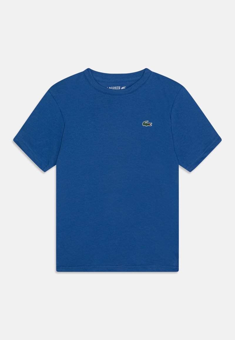 T-shirt bleu à manches courtes et col rond avec un petit logo crocodile vert sur la poitrine gauche.