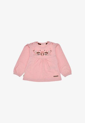Rosa Langarmshirt aus weichem Stoff, mit floralem Stickerei und Knopfakzenten an der Schulter. Plissierter Stil an der Taille.