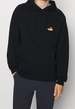 Black hoodie featuring a kangaroo pocket, drawstring hood, and small embroidered design on the chest. Soft fabric with ribbed cuffs and hem.