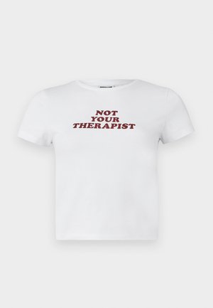 White cotton t-shirt with short sleeves featuring bold maroon text that reads "NOT YOUR THERAPIST" in a playful font.