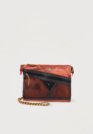 Small orange Klättermusen Algir pouch with black mesh front pocket, diagonal zipper, and yellow-red wrist strap.