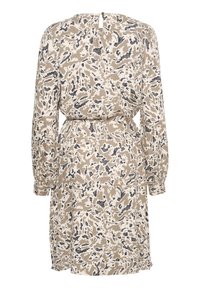 Robe à manches longues avec un motif abstrait beige et crème, agrémentée d'accents bleu foncé. Elle présente une taille cintrée et un détail dos en forme de trou de serrure.