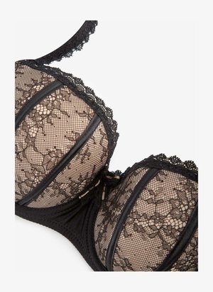 Czarny koronkowy stanik z kwiatowym wzorem, przezroczystymi miseczkami i czarnymi wykończeniami. Posiada regulowane ramiączka oraz wsparcie w postaci fiszbin. Teksturowany materiał, misternie zdobiona koronka.