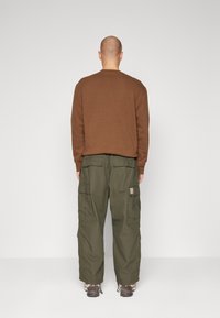 Carhartt WIP JET PANT - Hlačami s stranskimi žepi - cypress rinsed