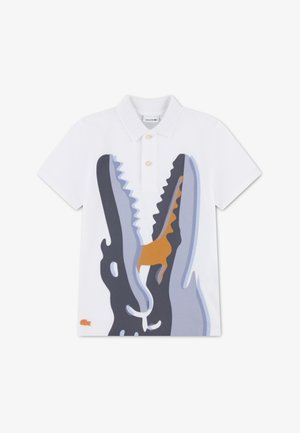 White polo shirt featuring a large graphic print of crocodiles in gray, blue, and orange. Made of cotton with a three-button placket.