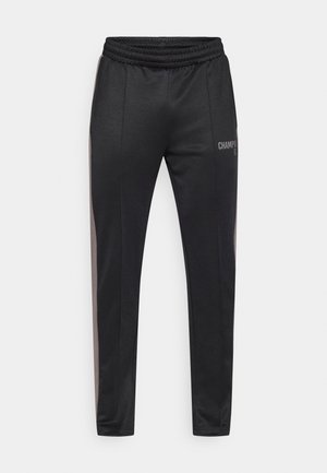 Schwarze Sporthose aus glattem Stoff mit tapered Schnitt, elastischem Bund, seitlichen Streifen in Dunkelgrau und Logodetail.