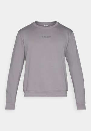 Grauer Langarm-Sweatshirt mit Rundhalsausschnitt, gerippten Bündchen und Saum. Mit kleinem "BJÖRN BORG"-Logo in Dunkelgrau auf der Brust. Weicher Stoff.