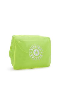 Bolsa verde brillante con una textura suave, que presenta un logotipo circular blanco y un diseño de estrella. Forma cuadrada compacta, adecuada para el almacenamiento.