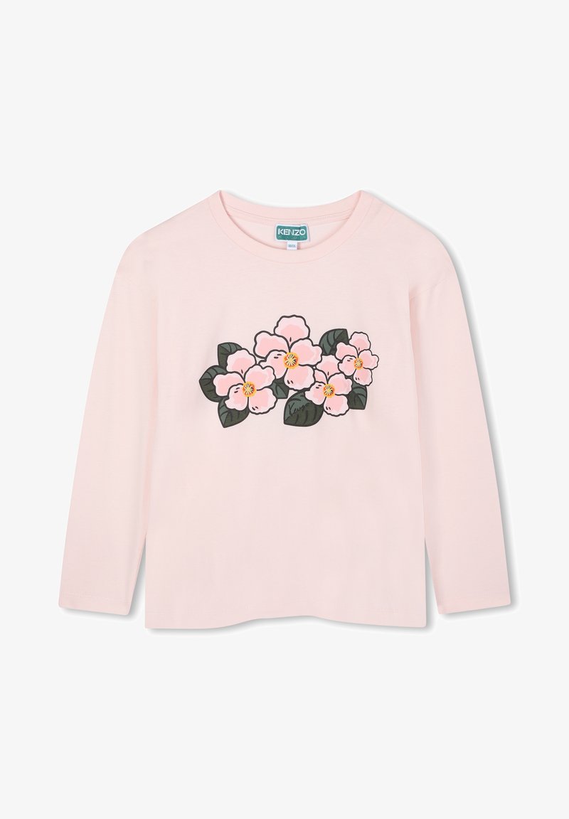 T-shirt à manches longues rose clair en coton, avec un design graphique floral comportant des fleurs roses et des feuilles vertes sur le devant.