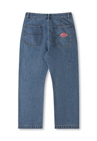 Blue denim pants featuring a high waist, straight leg design, two back pockets, and a small red logo patch on the right pocket.