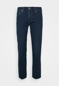 Tmavě modré džíny vyrobené z denimu, s rovným střihem, pěti kapsami, měděnými nitěmi a zapínáním na knoflík v pase.