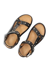 Černé kožené sandály s kovovými nýty, plochou podrážkou a popruhy na kotnících. Hnědé stélky a nastavitelné přezky na stranách. Design s otevřenou špičkou.