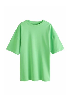 Schlichtes hellgrünes oversized Kurzarm-Baumwoll-T-Shirt mit Rundhalsausschnitt und abgefallenen Schulternähten, präsentiert auf weißem Hintergrund.