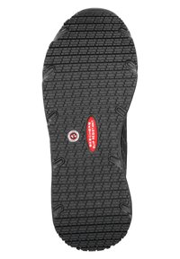 Suola di scarpa in gomma nera con superficie testurizzata, caratterizzata da un'etichetta rossa "Skechers Slip Resistant" e un'icona circolare antiscivolo.