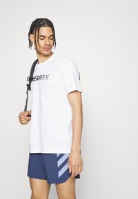 Adidas Terrex TERREX AGRAVIC TRAIL RUNNING SHORTS - Calções desportivos - blue/black
