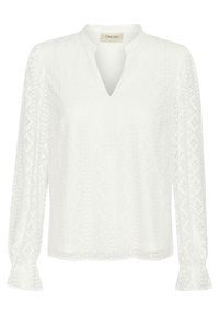 White long-sleeve blouse featuring a V-neck, intricate diamond-patterned texture, and ruffled cuffs. Made from lightweight fabric.