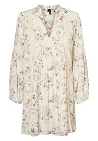 Kwiatowa sukienka z dekoltem w serek, długimi bufiastymi rękawami i koronkowymi detalami. Jasna kremowa tkanina zdobiona jest wielokolorowymi wzorami kwiatowymi.